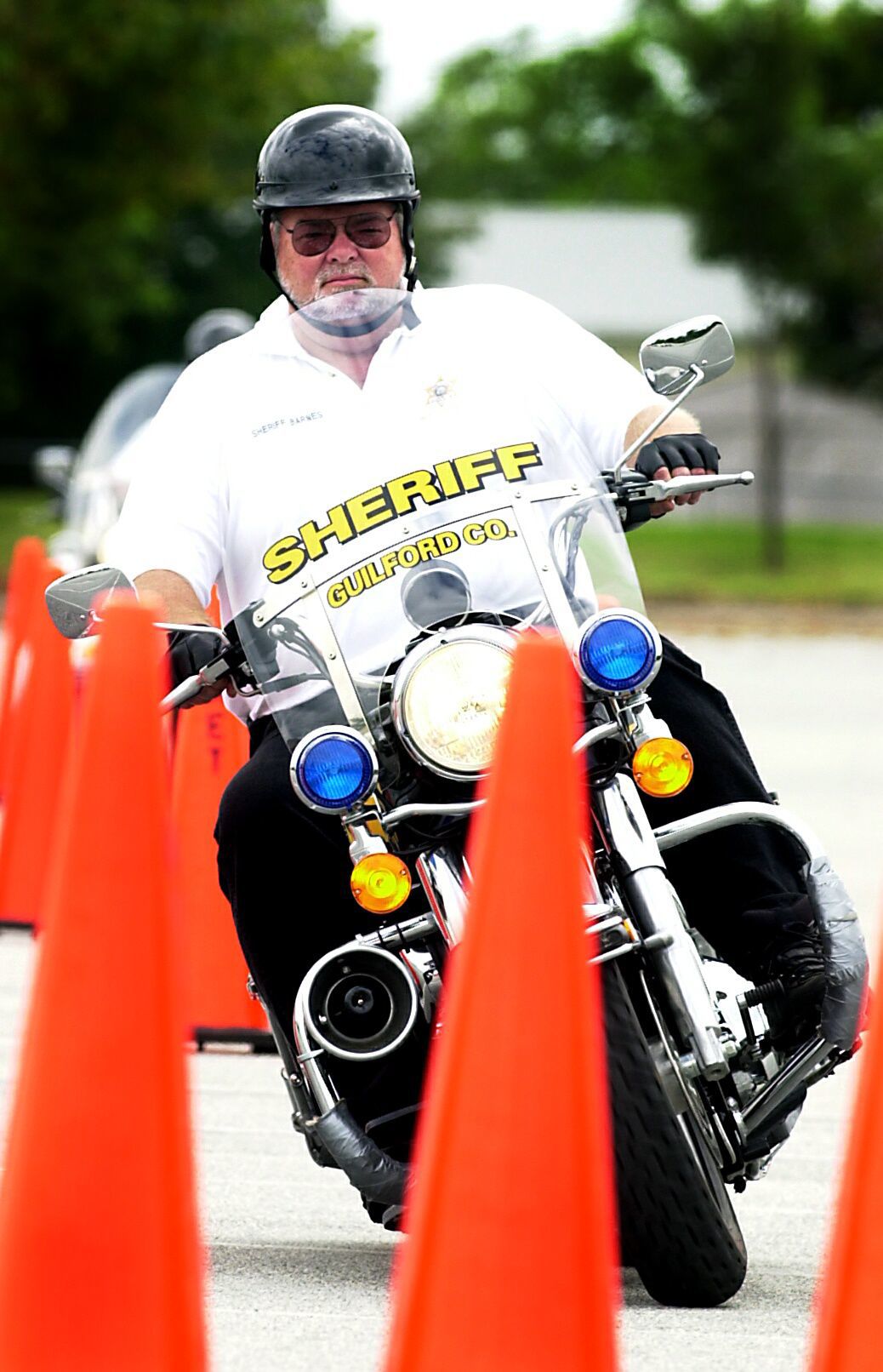 Sheriff BJ Barnes test drives motorcycle